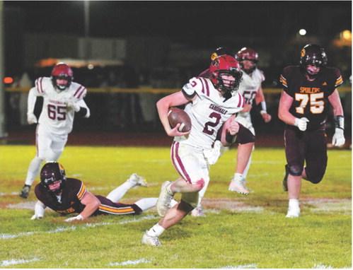 FM Bank Player of the Game Eastyn Schaefer rushes for 170 yards and throws for 221 yards, accounting for three touchdowns with no interceptions in the Cardinals’ win over the Grafton Spoilers. Photo by Larry Stokke