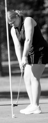 Langdon Area-Munich’s Victoria Matthews putts during the Turtle River Classic on Sept. 1 at Larimore Golf Course. Matthews placed 40th with a score of 137. Photo by Larry Stokke