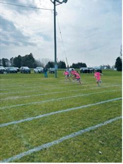 Young runners sprint from the starting line during one of the races at North Border School's Track and Field Day. Students spent the day competing in a variety of events while celebrating the final days of the school year. Submitted photo