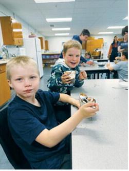 One group of parenting students taught preschoolers how to make dirt cups as part of a final project exploring fun summer activities that don't involve screens. The day also included scavenger hunts and fort building. Submitted photo