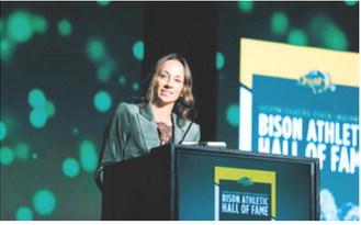 Langdon native Katie Lorenz Johnson speaks during her induction into the North Dakota State University Bison Athletic Hall of Fame on Oct. 2. Johnson, the 2001 North Dakota Miss Basketball recipient, went on to a standout career with the Bison. Submitted photo