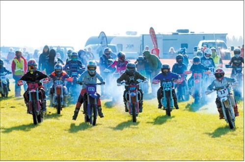 Riders charge from the starting line during the 20th annual Peterson Coulee Hare Scramble, held Sept. 12-13. Photo by Larry Stokke