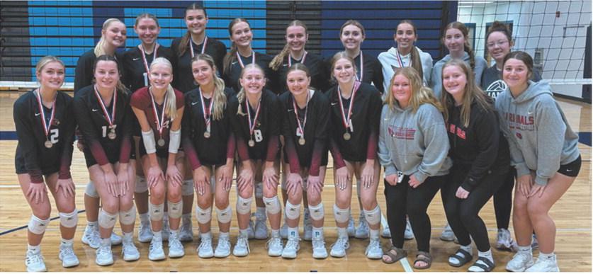 The Langdon Area-Munich Cardinals display their first-place medals after winning the Valley City volleyball tournament Sept. 19.