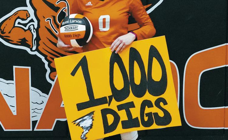 Remi Larson celebrated her 1,000th career dig on Nov. 8 in Cavalier's game against North Border. Photo by Larry Stokke.