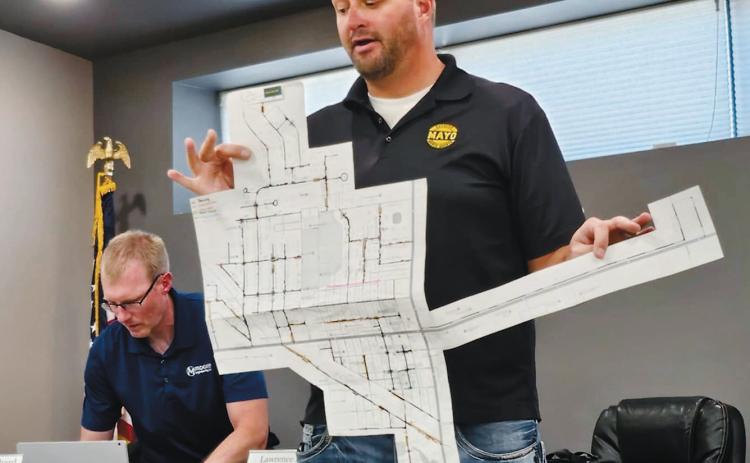 John Newman, vice-president with Mayo Construction, shows off his “winter project” – a map of the city of Langdon which highlights portions of road that are to undergo repairs over the summer. Early projections indicate by the end of September, around 70% of the roads around Langdon will see road improvements completed.