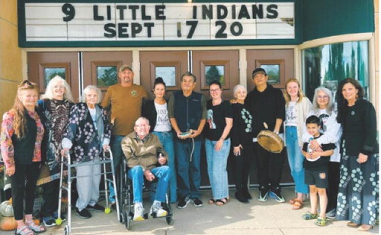 Francine Charbonneau Soli, Joann Charbonneau Braget, members of the Brant family and other friends and relatives gather outside the Walla Theatre during the “Nine Little Indians” screenings. Photo by Melanie Thornburg