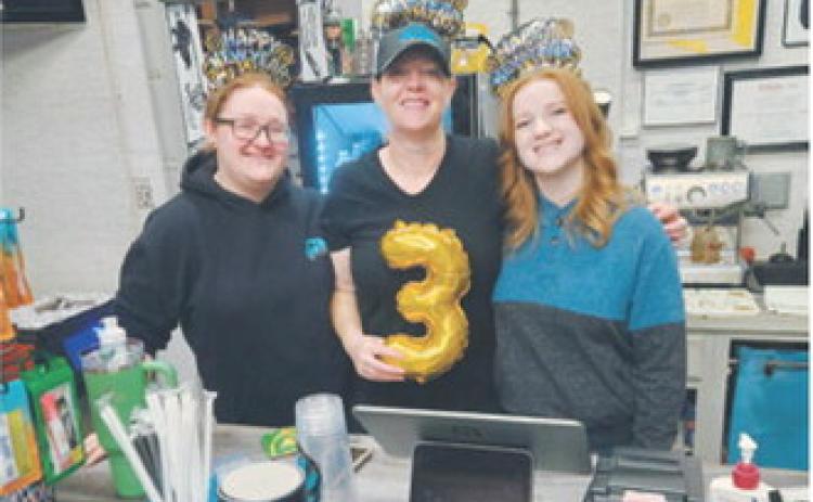 The Cure owner, Sara Price, pictured with her daughters, Makenna and Grace Follin. Submitted photo.