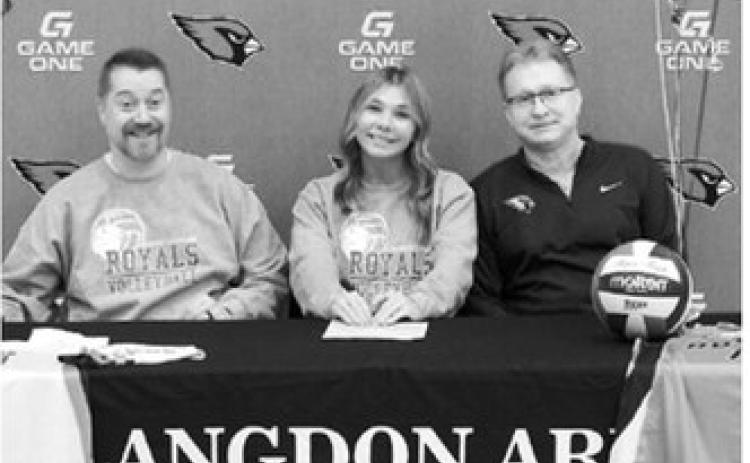 Raeleigh Ratzlaff, the only senior on the state champion Langdon Area-Munich volleyball team, has committed to Lake Region State College (LRSC) Athletics volleyball. She signed on Monday. Ratzlaff is pictured with Steve Waddell, head coach for the LRSC volleyball team and Rich Olson, Langdon Area-Munich head coach. Photo by Larry Stokke