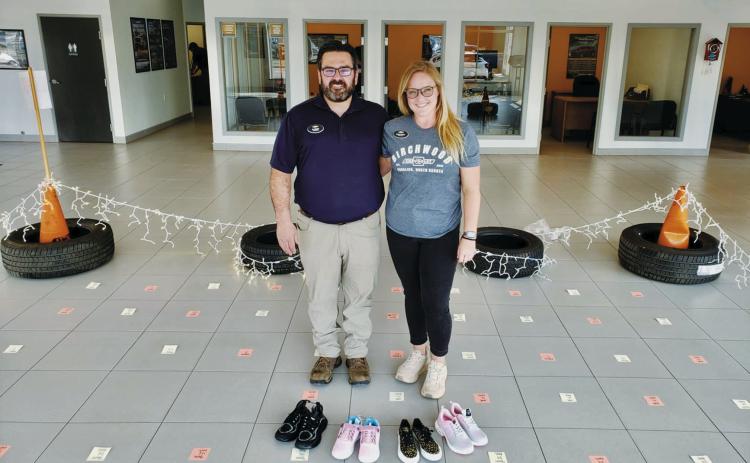 Al and Chris Berry hope to have a “pair for every square” at the end of the shoe drive. Submitted photo.