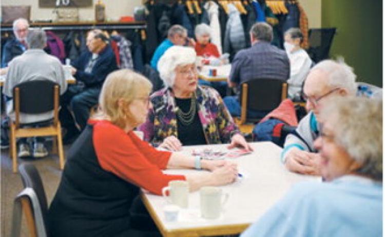 People gather at the Broadway Station Senior Center in Fargo on Wednesday, Dec. 10, 2025, for Pinochle Day. Chris Flynn / The Forum