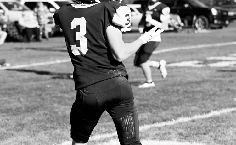 Oakley Brown successfully catches a pass and completes a touchdown. Photo by Ashley Schafer.