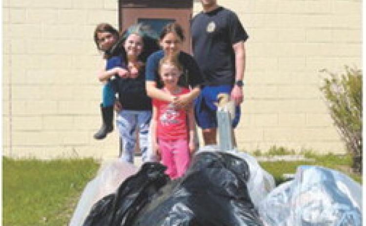 From left-right: Codie (Junior), Skylie (Junior), Amelia (Cadette), Myah (Daisy) and Commander Michael Stobie. Photo courtesy of Katie Stobie.