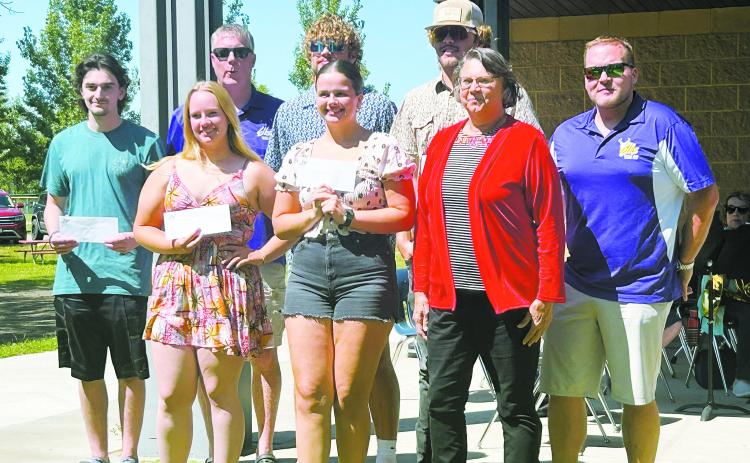 Back row (L-R) Landon Welsh, Andy Wakeford (scholarship committee member), Parker Simon, Karsen Simon, Joel Kurtz (scholarship committee member); front row, Jayden Bondy, Gabby Hanson, Kathy Lovseth (scholarship committee member).