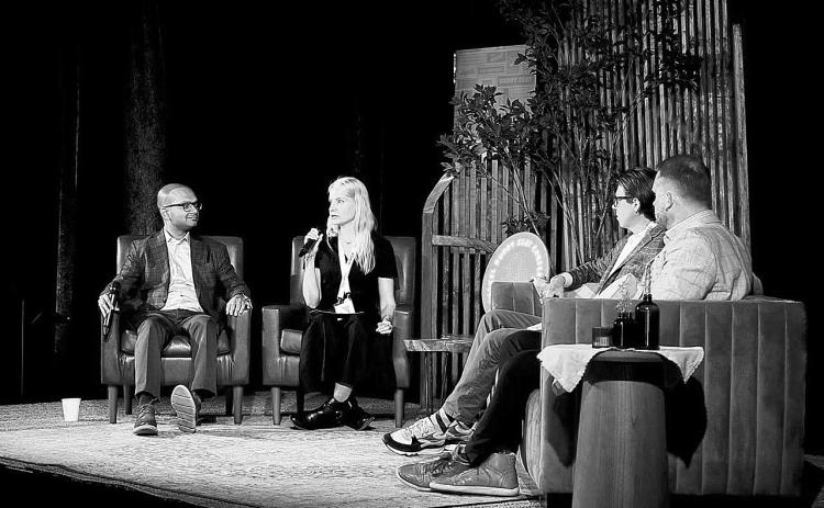 Suhas Narayanaswamy of Lewis and Clark AgriFood (left) in discussion with moderator Jennifer Marston of Ag Funder at a panel on innovations that will impact agribusiness in the future hosted by Bushel in Fargo in June. Patrick Honcoop (right), CEO of Ag-Tech Pro, and Jake Joraanstad (far right) listen in.