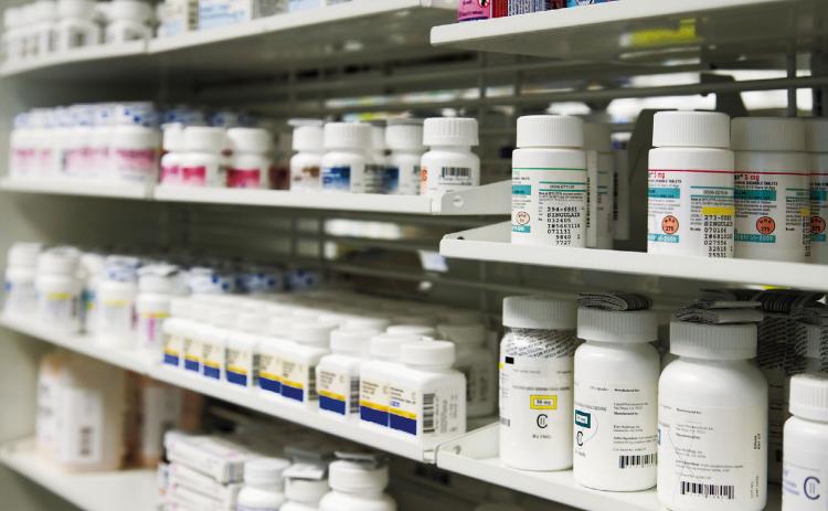 Drug manufacturers have sued North Dakota over a new law that will require them to sell more medication at a discount, arguing that it violates the U.S. Constitution and will harm their profits. (Photo by Mint Images/Getty Images)