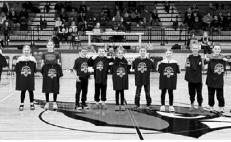 These young Cardinals were recognized at the boys basketball game on Feb. 17, where they also received t-shirts for their hard work. From L-R: Aksel Bredeson, Kalleigh Rollness, Breck Krivarchka, Laetyn Schaefer, Ben Schaefer, Scarlyt Schaefer, Gunnar Bredeson, Hazel Overby, Baylor Krivarchka, Jack Schaefer, Jaxtin Overby Submitted photo