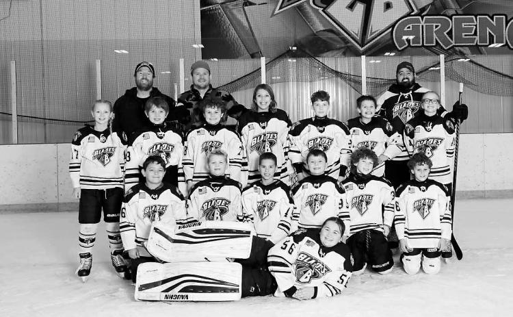 Coaches: Tyler Balsdon, Cale Borho, Tanner Romfo. Back row L-R: Addi Gaffke, Jamison Balsdon, Clint Crump, Brooklyn Mondor, Beau Busse, Hudson Romfo, Addison Schill. Kneeling L-R: Griffin Hoffman, Maverick Mostad, Braxton Mondor, Caden Downs, Warren Olson, Wyatt Crump. Front: Goalie- Lizzie Hakanson. Submitted photo