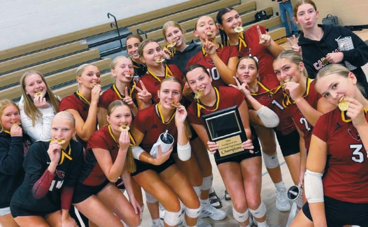 The Langdon Area-Munich Cardinals celebrate after winning the Northern Cass Tournament on Aug. 29. Submitted photo