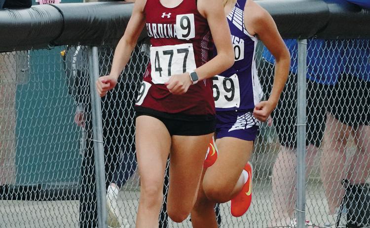 Olivia Lorenz running the 1600 meter run, which she finished with a great time of 5:41.09. Photo by Larry Stokke.