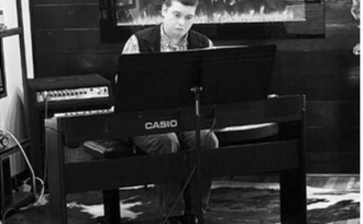 Lane Lindseth shows off his musical talent. He performed at Sip Happens and the Langdon Eagles Club last week. Submitted photo