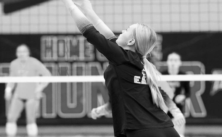 Jacy Fraser passes the ball to a teammate in Park River at the district volleyball competition. Photo by Larry Stokke.