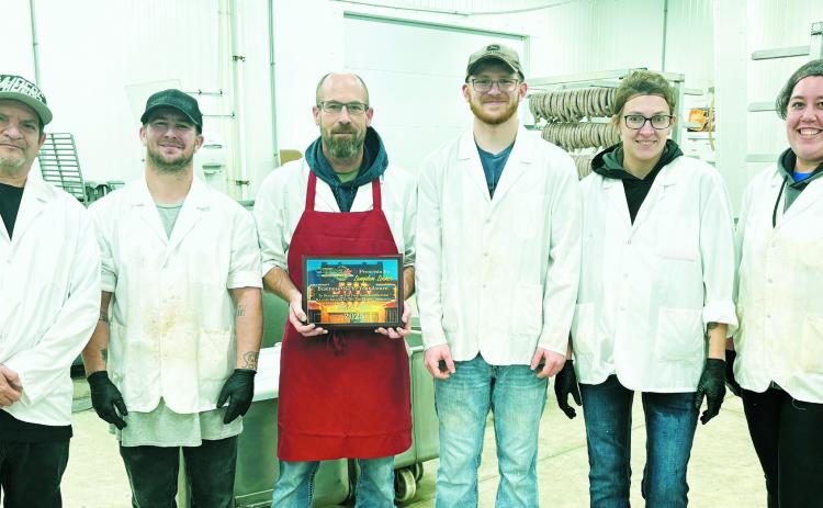 Langdon Locker was named Chamber Business of the Year at the annual Chamber of Commerce Banquet. From (L-R) Tom Aguilar, Dillion McMahon, Josh Metzger, Wyatt Kartes, Danielle Brown, Brittany Dulski (not pictured) Logan Feil, Bob Hall, Tyler Bodnar.