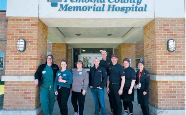 Members of the Rapid Relief Team and local volunteers pose outside Pembina County Memorial Hospital following a staff appreciation event that served approximately 140 hospital employees. Submitted photo