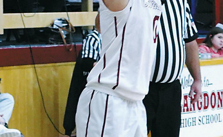 Jayden Lee added a couple 3-point baskets in the Cards’ win at home over the Tornadoes. Photo by Larry Stokke.