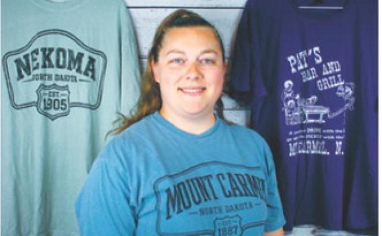Hanna Schneider, Hanna’s Baked Goods &amp; More, Langdon, offers occasional baked goods and shirt designs inspired by local communities. Submitted photo
