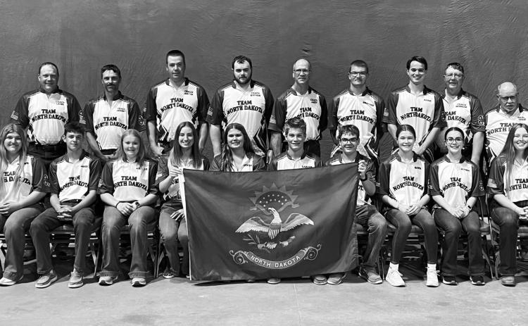 North Dakota 4-H shooting sports teams place at the 2024 4-H National Championships. Pictured are, back row from left, coach Layne Ferguson, coach Jeremy McGrath, coach Justin Bargmann, coach Nathan Sutton, coach Andy Boehm, Braydon Smith, Adam Sobolik, coach Norman, coach Doug Darling and front row, from left: Madison Knoke, James McGrath, Abagail Ferguson, Ellie Bargmann, Kendra Boehm, Layne Jansen, Zachary Korgel, Oliva Jansen, Alyssa Korgel, Rebecca Morstad.