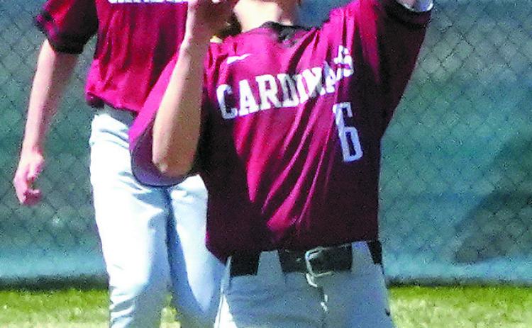 Connor Mitchell gloves a flyball for a third out against NRS. Photo by Larry Stokke.