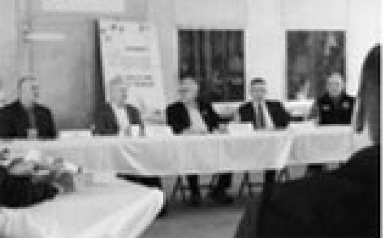 From left, Tom Bodine, North Dakota Department of Agriculture, Sen. John Hoeven, R-N.D., Richard Fordyce, U.S. Department of Agriculture, Gov. Kelly Armstrong and Jeb Williams, North Dakota Game and Fish, join other officials and stakeholders to discuss the Governor’s Legacy Soil Health and Habitat Program during a roundtable event in Mapleton on May 27, 2026. (Ceilidh Kern/For the North Dakota Monitor)