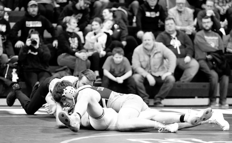 Oscar Martinez won his match with a pin over his Hillsboro-Central-Valley opponent. Photo by Larry Stokke.