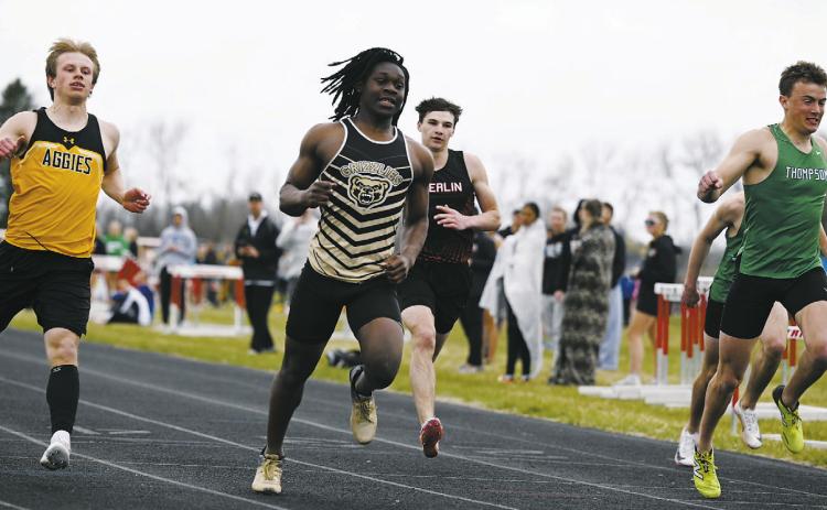 Micah Dutch of Pembina County North wins the 100-meter dash in 11.54 seconds in the meet at Mayville. Photo by Ashley Schafer