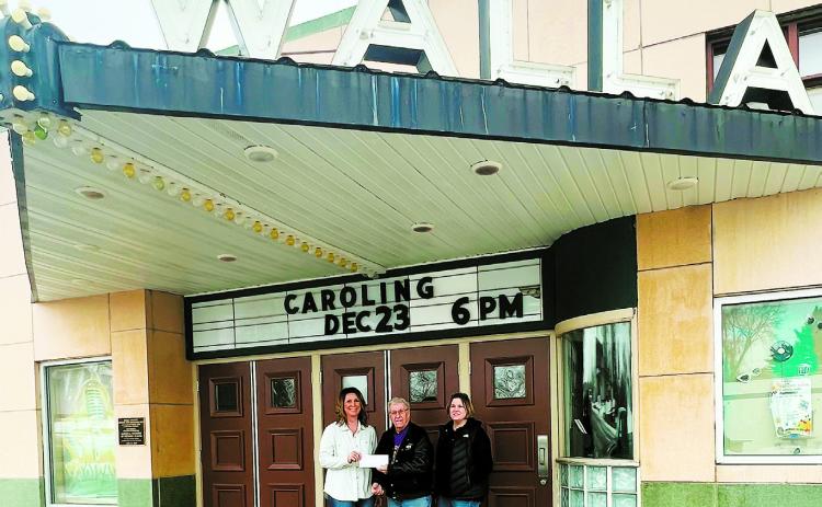 Kirsten Gendron (left), United Communications Customer Service Manager, presents a grant to Bill Zeller (middle), Vice President, and Susan Karel (right), President, of the Gorge Arts &amp; Heritage Council.
