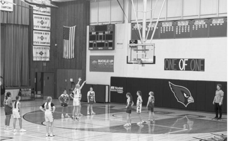 Langdon fifth grader Sawyer Moline shoots a free throw during the Cardinals’ 24-18 victory over Grafton on Sept. 14 at Langdon Area High School. Photo courtesy of Megan Overby