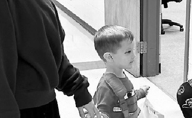 Jamestown high school student Larkin Kleven escorts Eddie Ranum in his ‘Cars’ costume at the Little Blue Jays Nest as she works toward credit for her Child Development Associate certification. Photo provided by Teresa Olson.