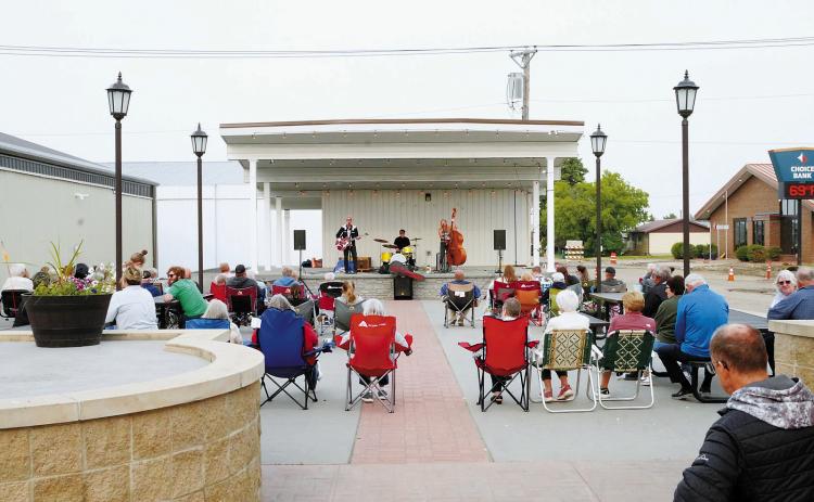 The Holy Rocka Rollaz performing 1950s rock 'n roll music last week at Boyd Block. Photo by Larry Stokke.