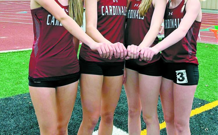 The state qualifying 4x800 relay team at the Anonymous Grizzly Invite in Grand Forks on April 21. Team members are Olivia Lorenz, Aubrey Badding, Hallie Overby and Mya Swanson. The team qualified with a time of 10:15.97.