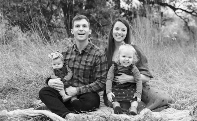Levi and Rachel Bachmeier with daughters Roslin (left) and Linden (right).