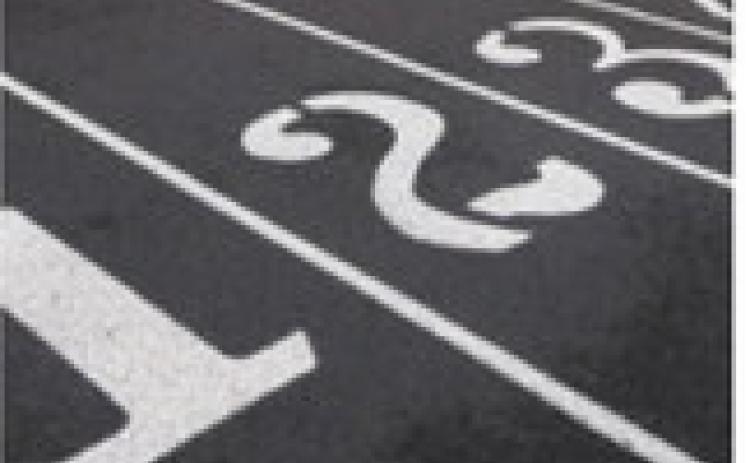 Cardinals perform at varsity track meet in Bottineau on April 21
