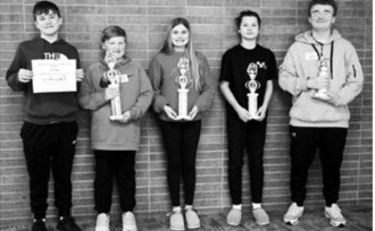 Cavalier County Spelling Bee L-R Written Vocabulary Test Winner Alex Bott from Langdon Middle School, 1st Place and State Qualifier Finley Smith from LAEM, State Qualifier 2nd Place Paisley Feil from LAEM, 3rd Place Finley Gage from Munich Public School, 4th Place Tristan Thompson from St. Alphonsus School. Photo by Larry Stokke