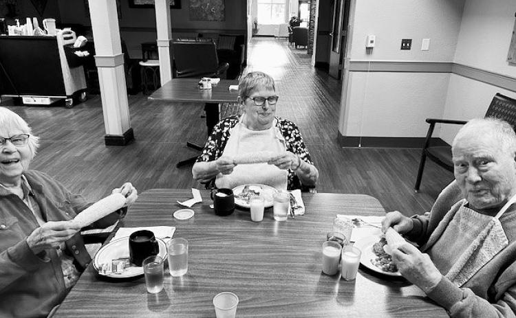 Doreen, Lorraine, and Howard enjoying their meal.