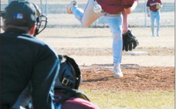 Jax Johnson sends a strike across the plate. He struck out seven Grafton batters in the Cards win. Photo by Larry Stokke