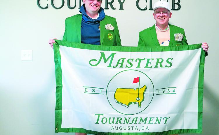 Winners of the tournament, James Childress and Jason Askvig, pose in their Masters green jackets. Photo by Larry Stokke.