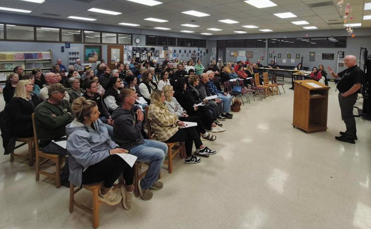 Over 100 community members gathered at the community forum on Monday, May 19, to discuss the upcoming referendum vote. Photo by Hilary Nowatzki.