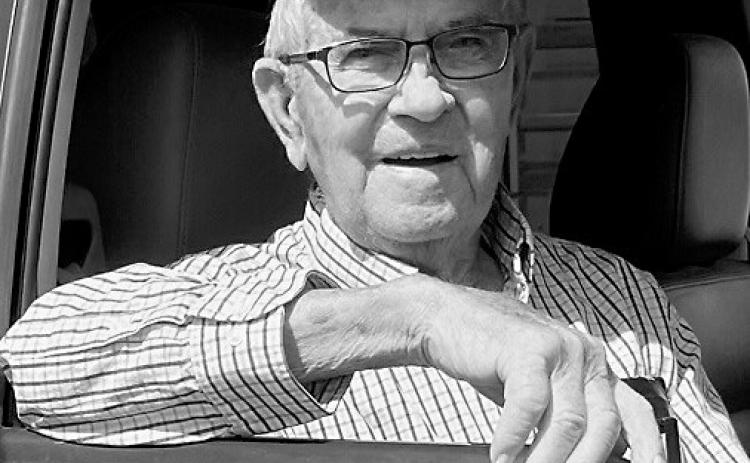 Clarence T. “Bud”