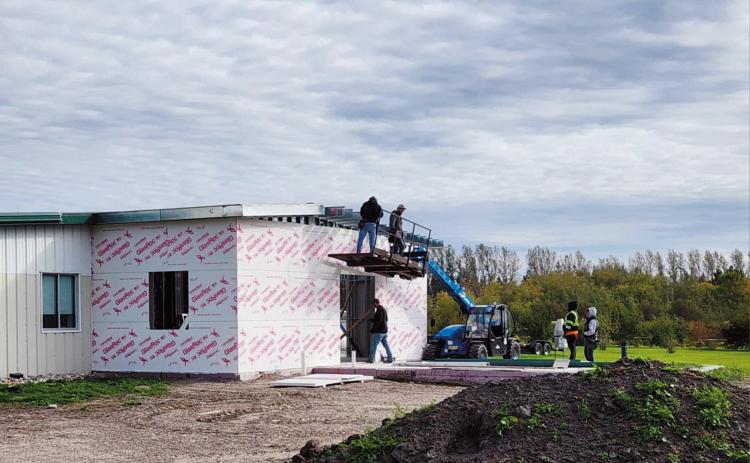 The outside frame of the entrance to the new greenhouse being put up on Oct. 1. Photo by Hilary Nowatzki.
