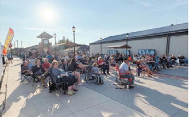 Community members gather at Boyd Block in downtown Langdon during the Northern Lights Arts Council Summer Concert Series. The free concerts drew large crowds throughout the three-week series, which featured local student, community and regional performers. Submitted photo