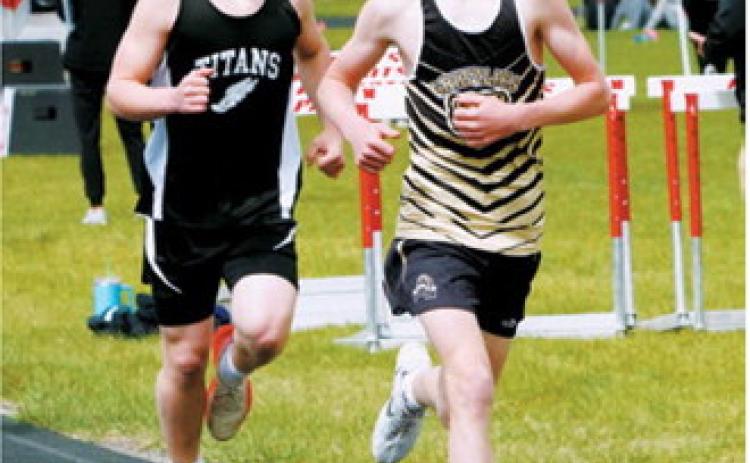 Nolan Pelletier ran to a personal-best time of 5:25 in the 1,600-meter run at the regional meet for the PCN Grizzlies. Photo by Larry Stokke